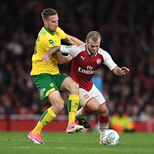 Arsenal's Jack Wilshere Clashes with Norwich's Marco Stiepermann in Carabao Cup Showdown