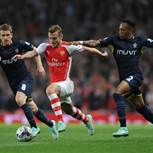 Arsenal's Jack Wilshere Clashes with Southampton's Davis and Clyne in League Cup Showdown