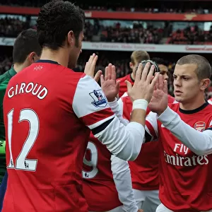 Arsenal's Jack Wilshere and Olivier Giroud Before Match vs. Queens Park Rangers (2012-13)