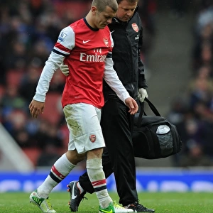 Arsenal's Jack Wilshere Receives Treatment from Physio Colin Lewin vs. Queens Park Rangers (2012-13)