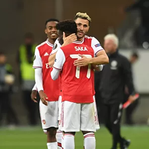 Arsenal's Kolasinac and Saka Celebrate Victory over Eintracht Frankfurt in Europa League