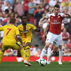 Arsenal's Koscielny vs Zaha: A Premier League Face-Off at Emirates Stadium