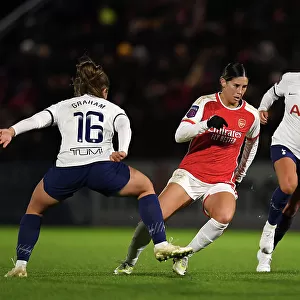 Arsenal's Kyra Cooney-Cross Fights for Possession in FA WSL Cup Clash Against Tottenham Hotspur