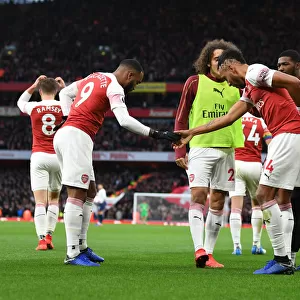 Arsenal's Lacazette and Aubameyang: Unstoppable Duo in Full Swing as They Celebrate Goals Against Tottenham in the 2018-19 Premier League Clash