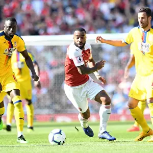 Arsenal's Lacazette Clashes with Kouyate and Milivojevic of Crystal Palace