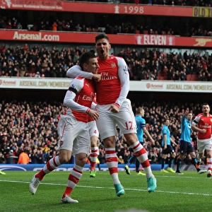 Arsenal's Laurent Koscielny and Olivier Giroud Celebrate Goal Against Stoke City (2014-15)