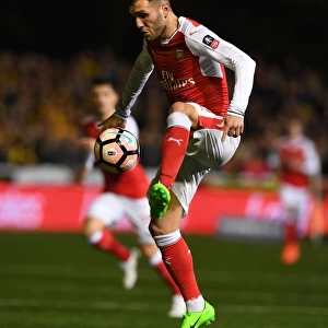 Arsenal's Lucas Perez in FA Cup Fifth Round Action against Sutton United