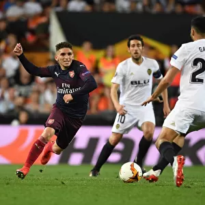 Arsenal's Lucas Torreira Clashes with Valencia's Ezequiel Garay in UEFA Europa League Semi-Final