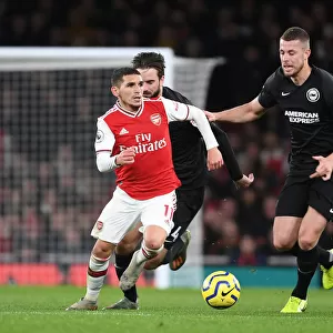 Arsenal's Lucas Torreira Outmaneuvers Brighton's Defenders during Premier League Clash