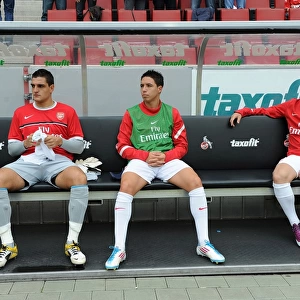 Arsenal's Mannone, Nasri, and Arshavin in Action during Cologne Friendly