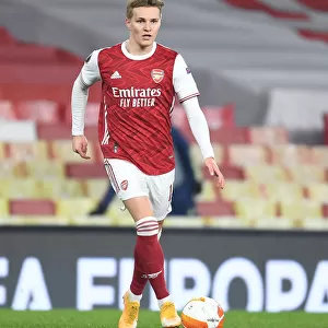 Arsenal's Martin Odegaard in Europa League Action Against Olympiacos at Empty Emirates Stadium