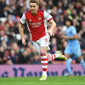 Arsenal's Martin Odegaard Faces Manchester City in Premier League Showdown