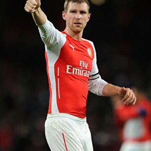 Arsenal's Per Mertesacker Celebrates with Fans after Arsenal v Newcastle United Win, 2014/15
