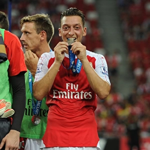 Arsenal's Mesut Ozil Leads the Team to Asia Trophy Victory over Everton