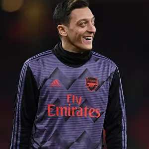 Arsenal's Mesut Ozil Warming Up Ahead of FA Cup Clash Against Leeds United