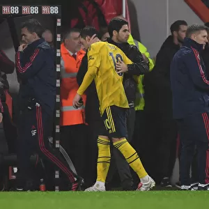 Arsenal's Mikel Arteta Embraces Mesut Ozil During AFC Bournemouth Clash (Premier League 2019-20)