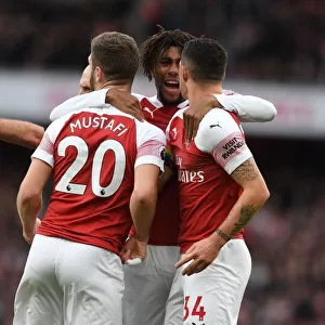 Arsenal's Mustafi, Xhaka, and Iwobi Celebrate Penalty Against Tottenham