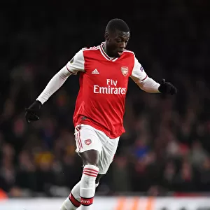 Arsenal's Nicolas Pepe in Action: Europa League Clash Against Olympiacos
