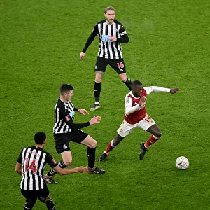 Arsenal's Nicolas Pepe Clashes with Newcastle's Ciaran Clark in FA Cup Third Round