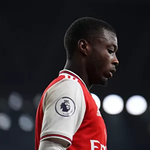 Arsenal's Nicolas Pepe Goes Head-to-Head with Manchester United in Premier League Clash
