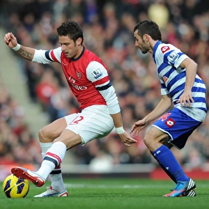 Arsenal's Olivier Giroud Fends Off QPR's Esteban Granero During Premier League Clash (2012-13)