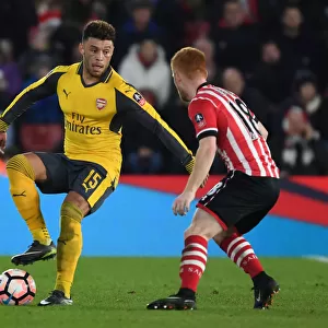 Arsenal's Oxlade-Chamberlain Clashes with Southampton's Reed in FA Cup Showdown