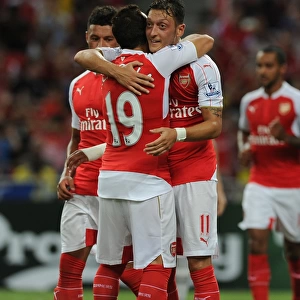 Arsenal's Ozil Scores Hat-Trick: Arsenal Triumphs Over Everton in Barclays Asia Trophy