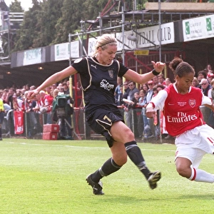Arsenal's Rachel Yankey and Lisa Dahlqvist of Umea Clash in UEFA Cup Final
