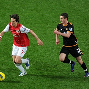 Arsenal's Rosicky Clashes with Forde in 2011-2012 Premier League Showdown