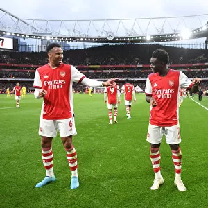 Arsenal's Saka and Gabriel Celebrate Second Goal Against Brentford (2021-22)