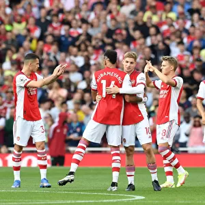 Arsenal's Smith Rowe and Aubameyang Prepare for Battle against Tottenham in Premier League Showdown