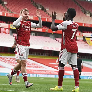 Arsenal's Smith Rowe and Saka Celebrate First Goal Against West Bromwich Albion in Empty Emirates Stadium (2020-21)