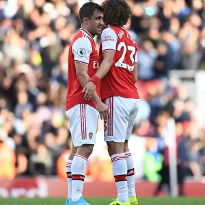 Arsenal's Sokratis and David Luiz: United in Defiance against Tottenham in the Premier League