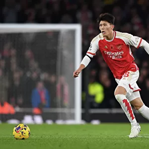 Arsenal's Tomiyasu in Action against Burnley in the Premier League (2023-24)