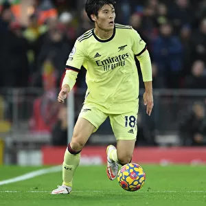 Arsenal's Tomiyasu Stands Strong: A Defiant Performance at Anfield (2021-22)
