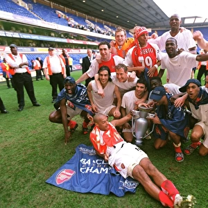 Arsenal's Triumph: Champions Celebrate at White Hart Lane, 2004
