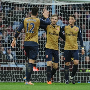 Arsenal's Triumph: Ramsey, Ozil, and Giroud's Goal Celebrations vs. Aston Villa (December 2015)