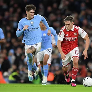 Arsenal's Trossard Clashes with Man City's Stones in FA Cup Showdown