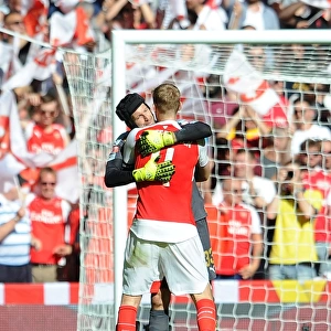 Arsenal's Unforgettable Embrace: Cech and Mertesacker Celebrate Community Shield Victory (2015-16)