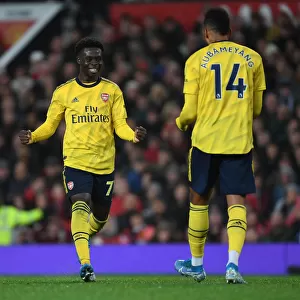 Arsenal's Unforgettable Goal Celebration: Aubameyang and Saka's Strike Secures Victory Over Manchester United, 2019-20 Premier League