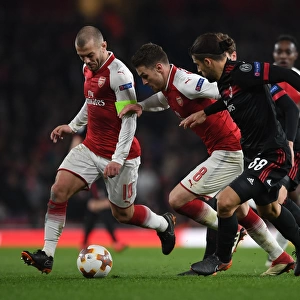 Arsenal's Wilshere and Ramsey Clash with Milan's Rodriguez in Europa League Showdown