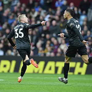 Arsenal's Zinchenko and Saliba: Celebrating a Goal Against Aston Villa (2022-23)