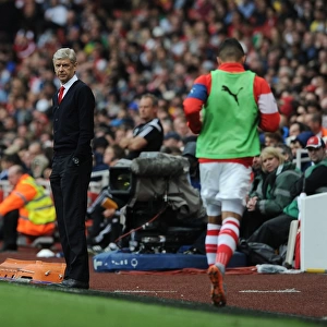 Arsene Wenger and Arsenal Face Off Against West Bromwich Albion in Premier League Showdown (2014/15)