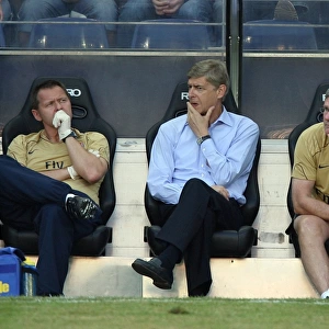Arsene Wenger Arsenal Manager with Pat Rice (Assistant Manager) and Gary Lewin (Physio)