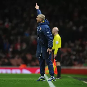 Arsene Wenger Leads Arsenal Against Queens Park Rangers in Premier League Clash (December 2014)