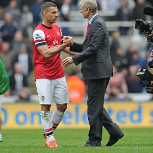 Arsene Wenger and Lukas Podolski Celebrate Arsenal's Win at Newcastle United (2012-13)