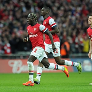 Bacary Sagna (Arsenal) celebrates winning the penalty shoot out. Arsenal 1: 1 Wigan Athletic