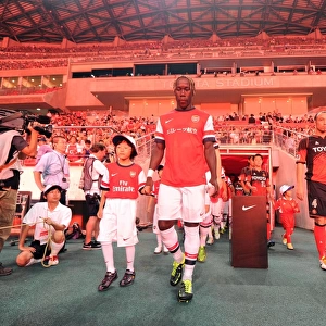 Bacary Sagna and Arsenal Mascot Prepare for Nagoya Grampus Match, 2013