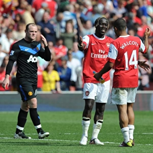 Bacary Sagna and Theo Walcott (Arsenal) Wayne Rooney (Man United). Arsenal 1