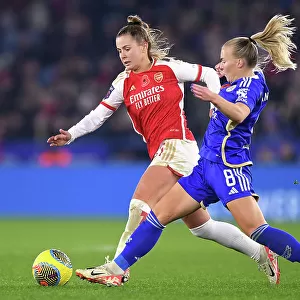 Battle for Possession: Victoria Pelova's Intense Duel with Jutta Rantala - Arsenal FC vs. Leicester City, Barclays Women's Super League